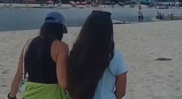 Policial à paisana prende mulher suspeita de matar o marido em praia na Palhoça (SC) — Foto: Reprodução/Polícia Civil